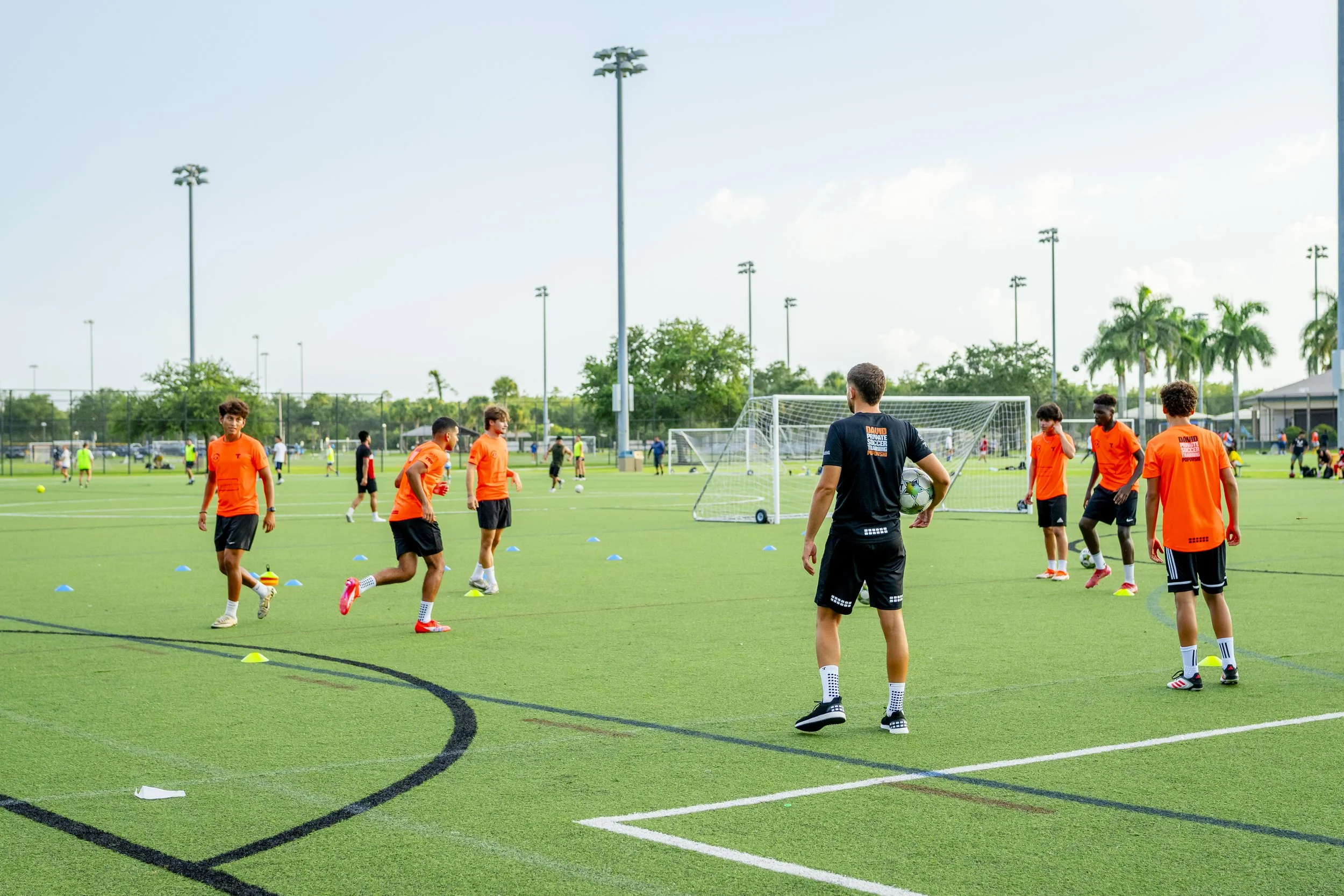 Players in a small group drill with Coach David in Naples